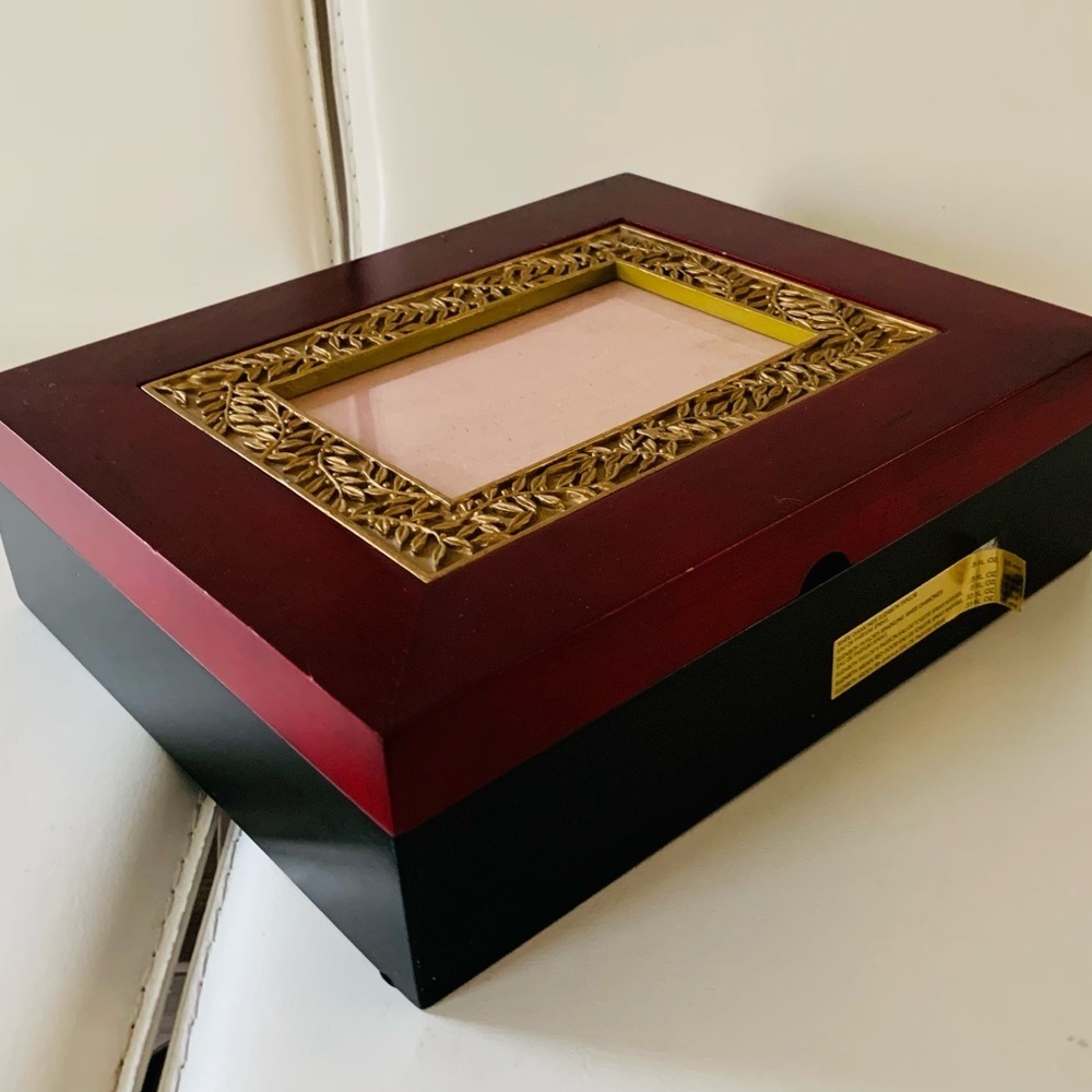 Elegant Red and Black Jewelry Box with Gold Accents